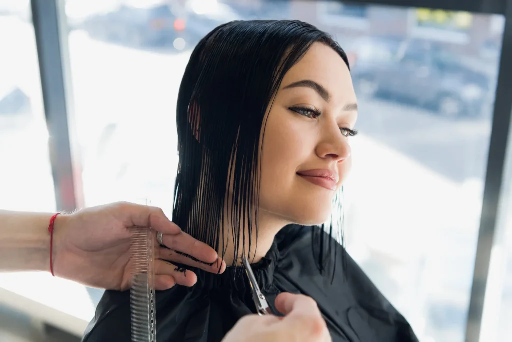 Photo of a woman getting a haircut